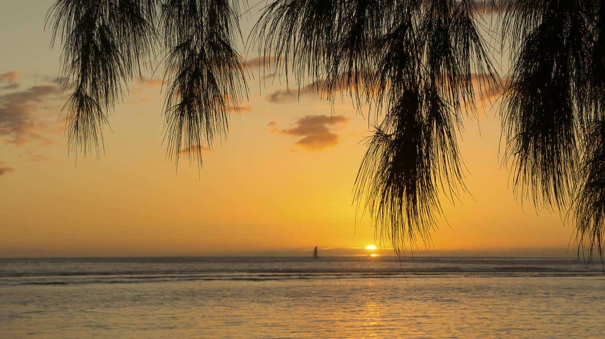 Photo of a sunset at Roches Noires beach on Reunion Island